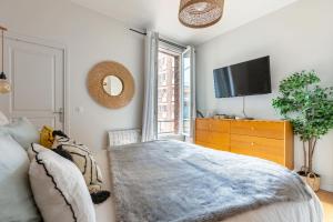 Appartements Cozy Pineapple - proche du 17 eme : photos des chambres