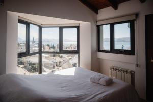 Penthouse con vista a las montañas y lago
