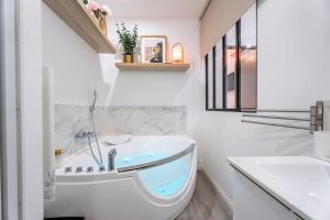 LARCADE SECRETE Appartement climatisé, Jacuzzi, Borne darcade Bordeaux centre