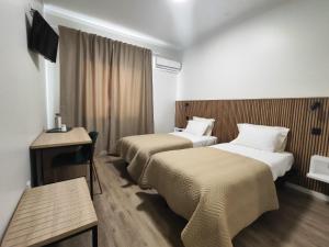 Twin Room room in Residencial Centro Comercial Avenida Bragashopping