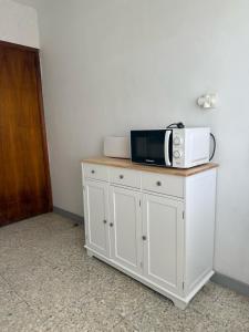 Casa con jardín y bajada al mar en Raxó