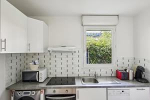 Appartements Grand F2 de 50m2 pour 4 personnes - Paris 10eme Gare du Nord, Stade de France : photos des chambres
