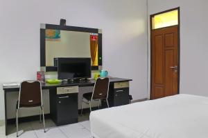 Collection O near Radin Inten II Airport formerly Hotel Aero