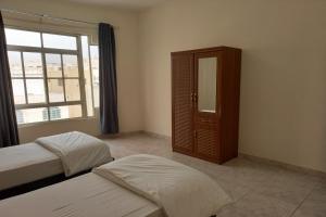 Super OYO 147 Babylon Furnished Apartment