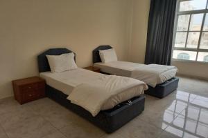Super OYO 147 Babylon Furnished Apartment