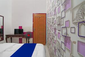 Hotel O Putri Guest House Syariah Near SPBU Rimbo Panjang