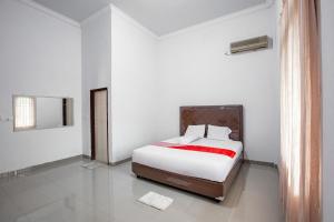 Hotel O Homestay Romauli Kampung Radja
