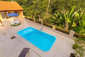 Casa com piscina aquecida e vista (Pirenopolis-GO)