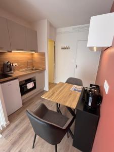 Appartements Le D'Artagnan - App 2 - Rez de chaussee : photos des chambres