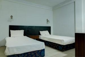 Hotel O Ervina Homestay Syariah Batakan