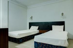 Hotel O Ervina Homestay Syariah Batakan