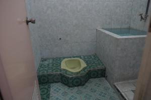 spot on 92665 yoko kost syariah