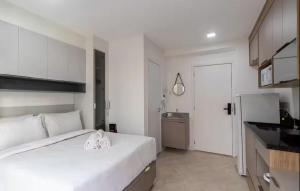 studio av paulista com varanda