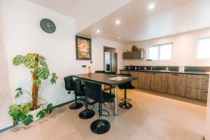 Grand appartement rez de jardin