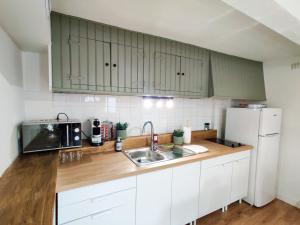 Appartements Le Refuge du Chateau : photos des chambres