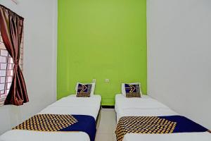 Hotel O Penginapan Puti SyariahNearBandara Sultan Syarif Kasim II