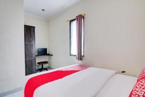 Hotel O Raya Guest House Syariah