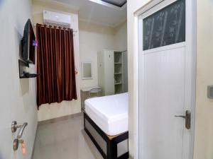 OYO Life 92707 D-akomiba Residence