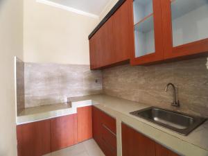 OYO Life 92707 D-akomiba Residence