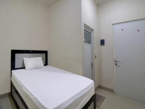 OYO Life 92707 D-akomiba Residence