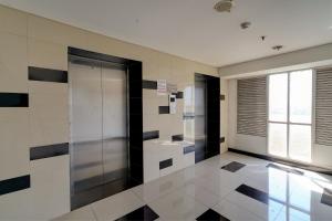 OYO Life 92889 Apartement Grand Sentraland Karawang By A.t Room