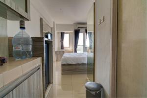 OYO Life 92889 Apartement Grand Sentraland Karawang By A.t Room