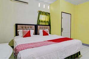 OYO 93206 Penginapan Budi SyariahNearTaman Amaryllis Pekanbaru