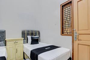 Capital O 93361 Dynasty Inn Syariah