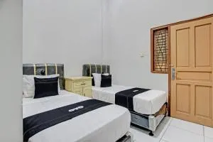 Capital O 93361 Dynasty Inn Syariah - 北加浪岸