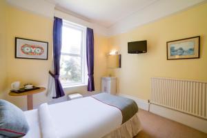 Standard Single Room with Shared Bathroom room in OYO Eagle House Hotel