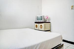 SPOT ON 93475 Garuda Homestay Syariah