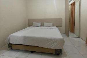 Hotel O Homestay Pakmuklis Syariah 2 Near Taman Mini Lhokseumawe