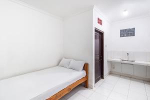 OYO Life 93504 Kost Krisna