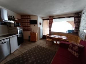 Résidence Ferme Daugustin - Batiment F - Superbe appartement pieds des pistes avec terrasse MAE-6121