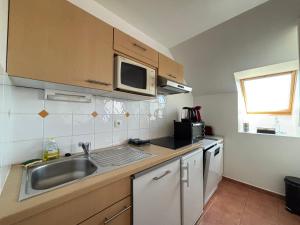 Appartements L'air marin Apt avec belle terrasse vue degagee sejour lumineux 10 mn a pied mer et centre Port en Bessin, tous commerces et restaurants, proche Bayeux et Omaha Beach : photos des chambres
