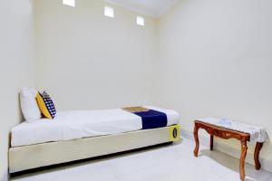 SPOT ON 93711 Kenzie Bunkbed Syariah