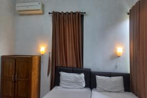 Capital O 93872 Natura Guest House Syariah Near alun alun kota purwokerto