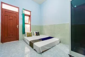 SPOT ON 93965 Ibrahim Guest House Syariah - 谏义里