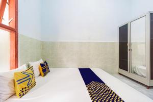 SPOT ON 93965 Ibrahim Guest House Syariah