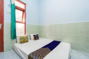 SPOT ON 93965 Ibrahim Guest House Syariah