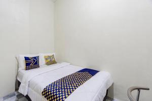 SPOT ON 93967 Hasna Guest House Syariah