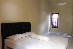 OYO 94015 Kost Alif Near Masjid Jami Nurul Huda