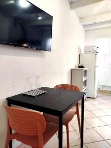 Appartements Le Petit Studio : photos des chambres