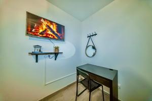 Appartements ValenStay - Logement Stade du Hainaut avec jardin : photos des chambres