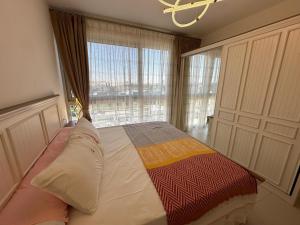 Amazing 1BR Marassi North coast Y401