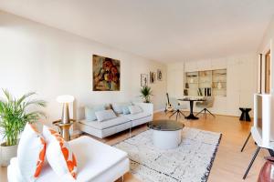 Spacieux 2 pièces rénové avec terrasse et parking proche La Défense