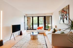 Spacieux 2 pièces rénové avec terrasse et parking proche La Défense