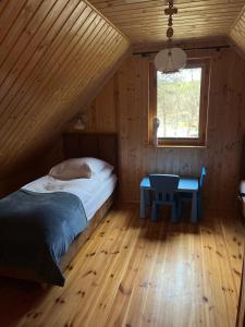 Domek całoroczny HAWAJE nad jeziorem Kazub