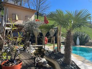 Maisons de vacances Tiny Gite le Roscoland a La Marc-Quize, avec dortoir mansarde, piscine partagee a debordement en exterieur, bain nordique a 38 degres en prestation supplement sur reservation horaire anticipee 1 place de parking sous reservation horaire anticipee : photos des chambres