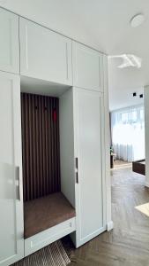 Šviesus ir šiltas butas Šiaulių miesto centre